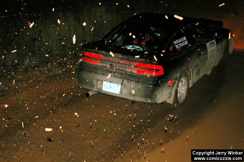 Mike Bodnar / Elaine Sheaks Misubishi Eclipse GSX slings wet gravel at the final corner of SS4, Echo Lake 1.