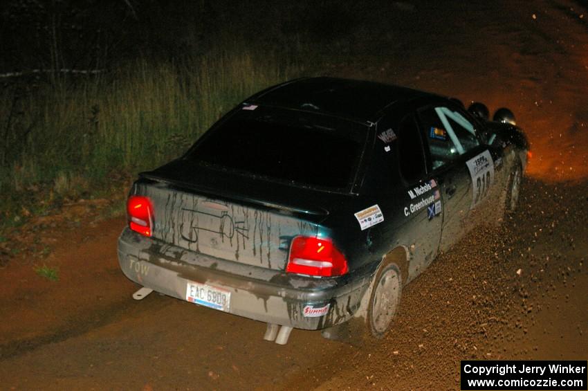 Chris Greenhouse / Matt Nichols Dodge Neon on slings rocks on the final corner of Echo Lake 1, SS4.