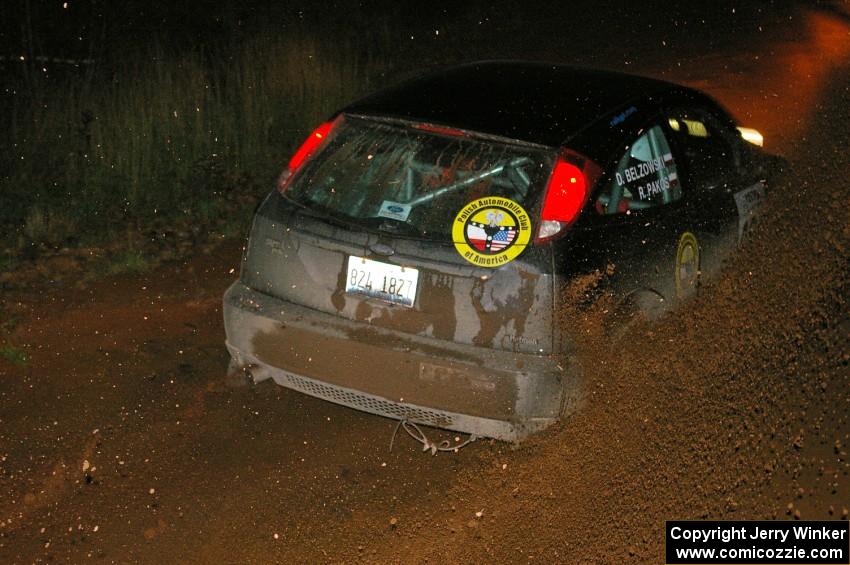 Roman Pakos / Dariusz Belzowski	Ford Focus SVT slings gravel at the final corner of SS4, Echo Lake 1.