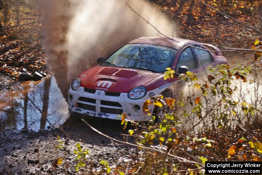 Doug Shepherd / Karen Wagner Dodge SRT-4 hit a large puddle near the end of gratiot Lake 1, SS9.