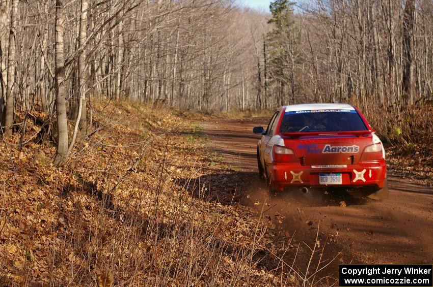 Jeff Moyle / Mike Yarroch Subaru WRX flies though a sweeper on Gratiot Lake 1, SS9.