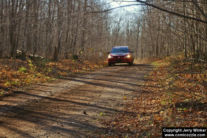 Amy BeberVanzo / Alex Kihurani Mitsubishi Lancer Evo 8 blasts down a straight on Gratiot Lake 1, SS9.