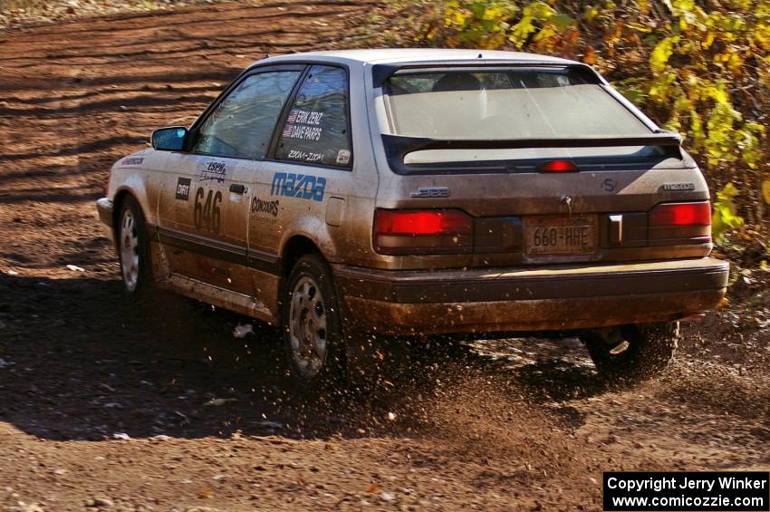 Erik Zenz / Dave Parps Mazda 323GTX through the final corner of Gratiot Lake 1, SS9. They DNF'ed later that day.