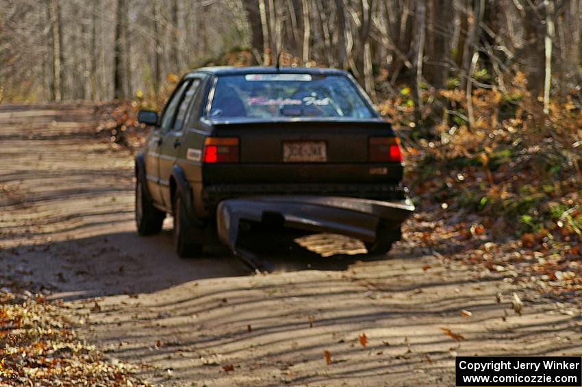 Ivan Milanovic / Colin Vickman Volkswagen Jetta GLI drags the bumper at the finish of Gratiot Lake 1, SS9.