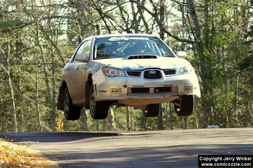 Piotr Wiktorczyk / Martin Brady	Subaru WRX catch air at the midpoint yump on Brockway 1, SS12.