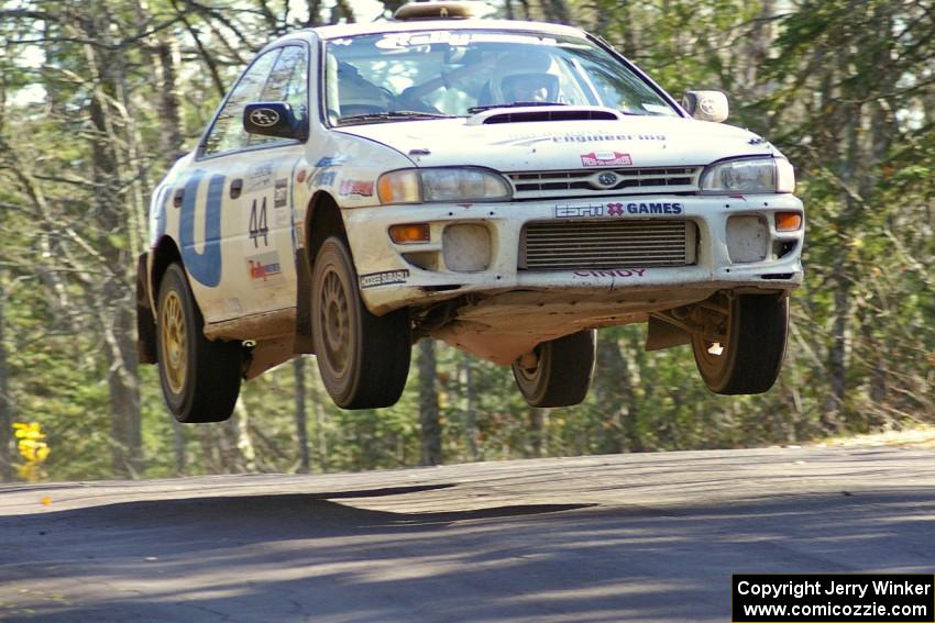 Henry Krolikowski / Cindy Krolikowski Subaru WRX gets big air at the midpoint of Brockway Mountain, SS13.