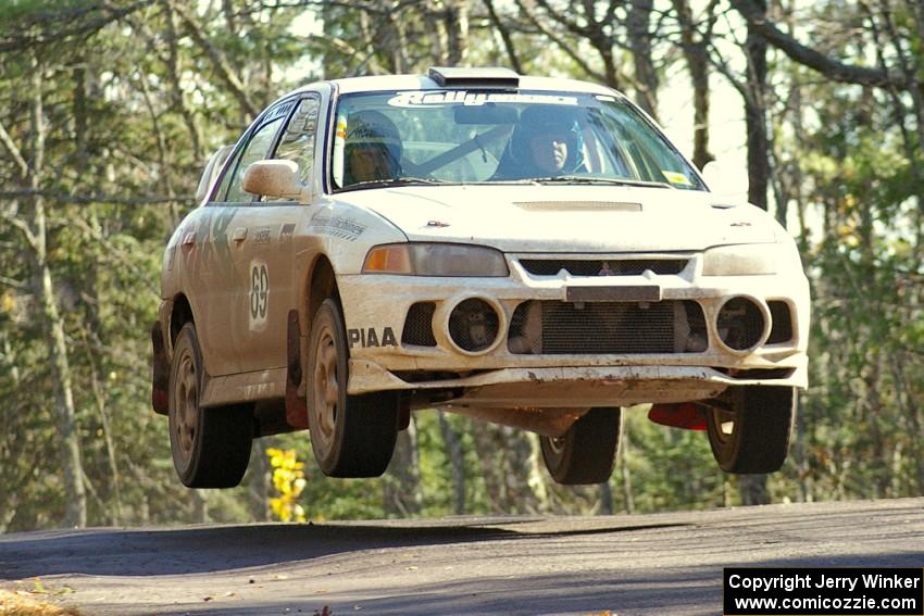Charles Sherrill / Wilson VonKessler Mitsubishi Evo IV cathes air at the midpoint yump on Brockway 1, SS12.