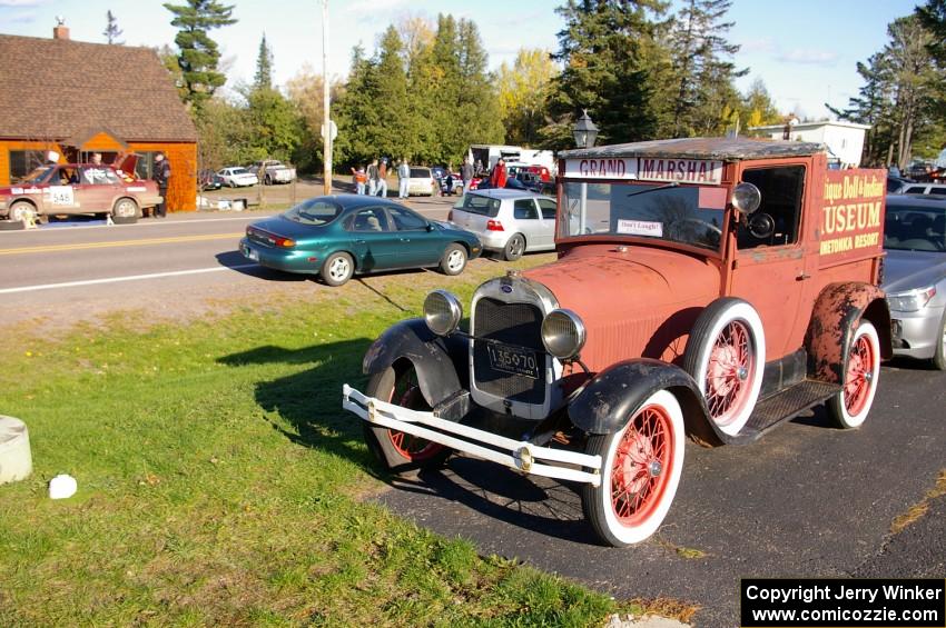 Matt Bushore / Andy Bushore VW Jetta gets serviced in Copper Harbor across the street from a Ford Model "T" pickup.