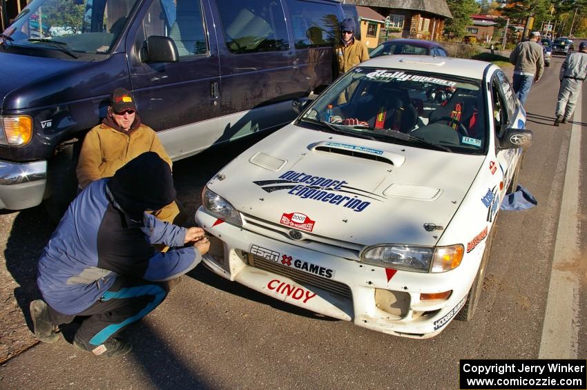 Henry Krolikowski / Cindy Krolikowski Subaru WRX gets serviced in Copper Harbor after running Brockway Mountain, SS13.