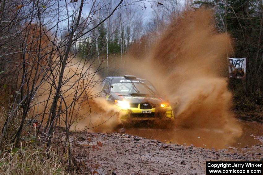 Andy Pinker / Robbie Durant Subaru Impreza WRX at the final puddle on Gratiot Lake 2, SS16.