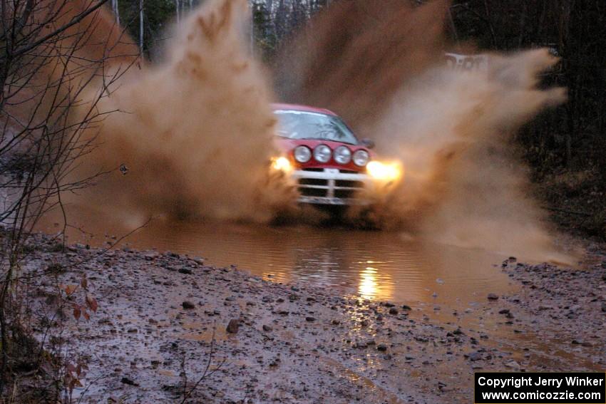 Doug Shepherd / Karen Wagner Dodge SRT-4 hits the final puddle near the finish of Gratiot Lake 2, SS16.