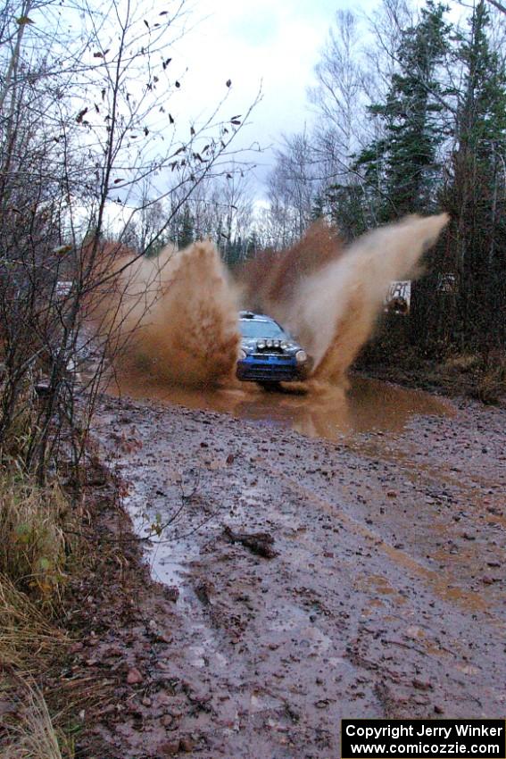 Cary Kendall / Scott Friberg Dodge SRT-4 hits a large puddle near the finish of Gratiot Lake 2, SS16.