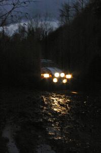 Mark Utecht / Rob Bohn Ford Mustang hits the final puddle on SS16, Gratiot Lake 2.