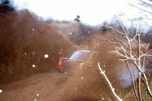 Bryan Pepp / Jerry Stang Subaru WRX at speed through the final puddle on Gratiot Lake 2, SS16.