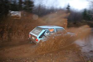 Tom Burress / Don Burress VW Rabbit hit the big puddle on Gratiot Lake 2, SS16. They were 16th overall, 1st in Group 2.