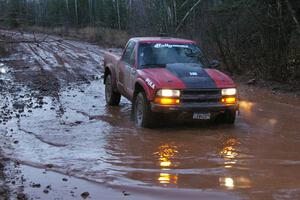 Jim Cox / Brent Carlson stop at the final water-crossing before transiting SS16, Gratiot Lake 2, in their Chevy S-10.