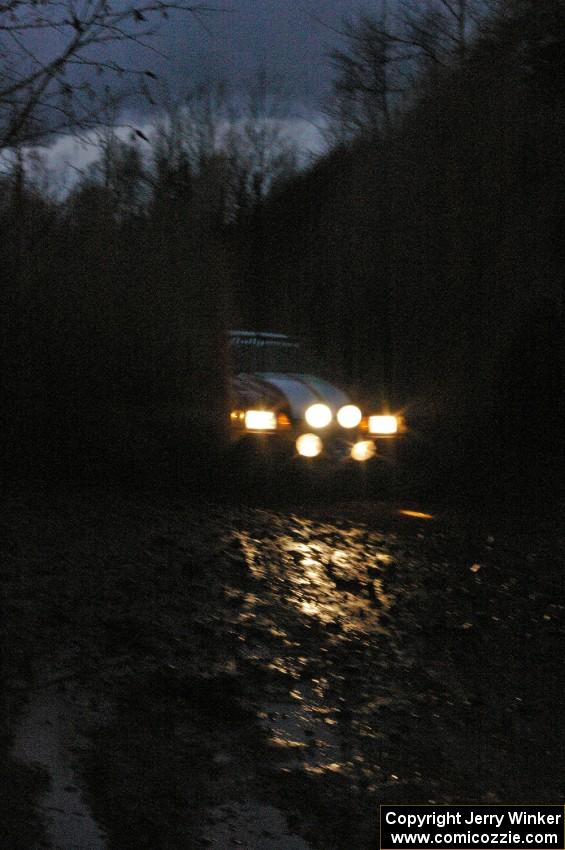 Mark Utecht / Rob Bohn Ford Mustang hits the final puddle on SS16, Gratiot Lake 2.