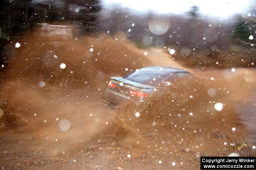 Adam Markut / John Nordlie Eagle Talon hits the final puddle on Gratiot Lake 2 during the snowstorm.