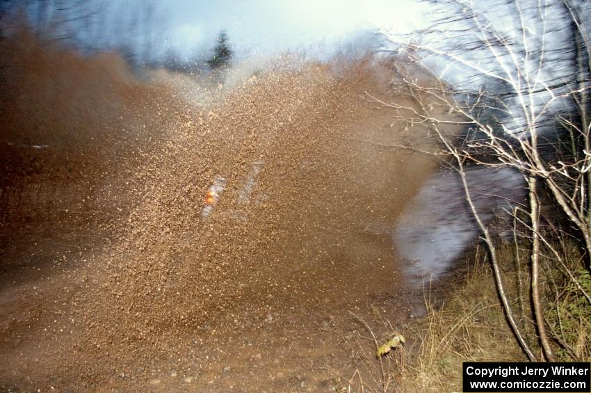 Lars Wolfe / Kent Gardam VW Jetta Turbo hits the final puddle near the end of Gratiot Lake 2 in a big way.