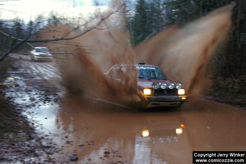 Matt Bushore / Andy Bushore VW Jetta hits the final puddle while transiting on Gratiot Lake 2, SS16.