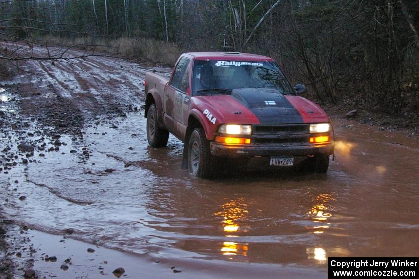 Jim Cox / Brent Carlson stop at the final water-crossing before transiting SS16, Gratiot Lake 2, in their Chevy S-10.