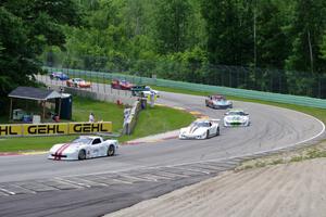 Front end of the field comes through Canada Corner on the pace lap.