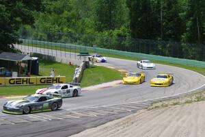 Back end of the field through Canada Corner on the pace lap.