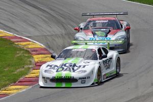 Tomy Drissi's Jaguar XKR ahead of R.J. Lopez's Chevy Corvette