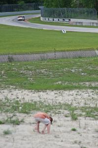 Two MX-5s at speed through the kink