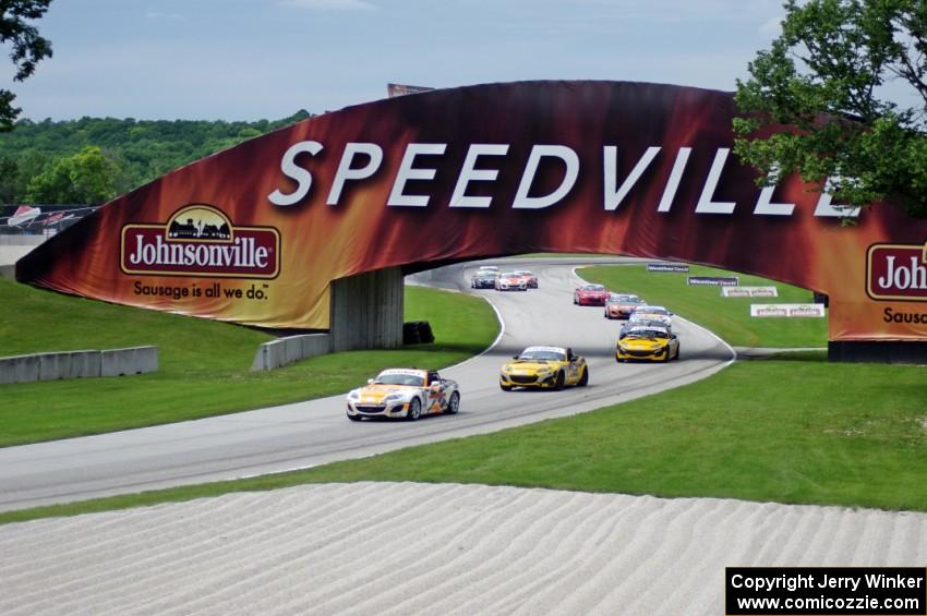 MX-5s entering the carousel