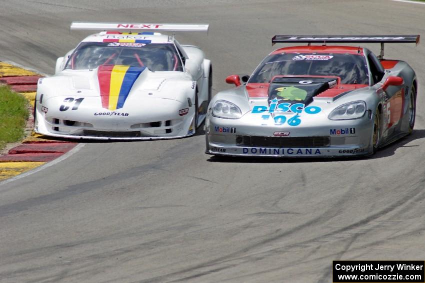 Mike Skeen's Chevy Corvette gets inside of R.J. Lopez's Chevy Corvette at Canada Corner.