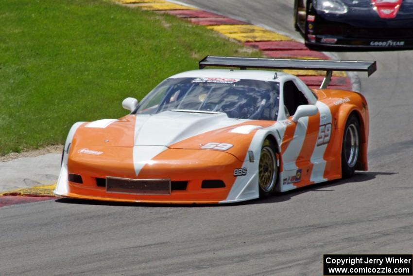 Simon Gregg's Chevy Corvette ahead of Terry Giles' Chevy Corvette