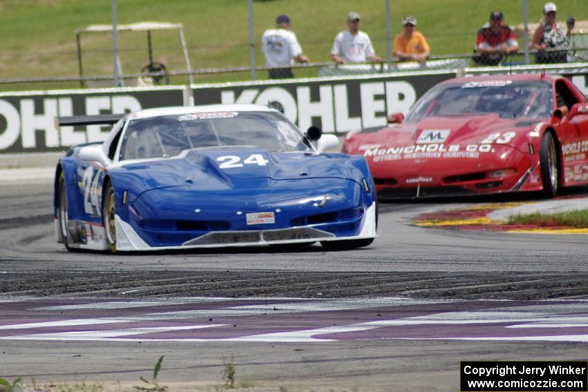 Rick Dittman's Chevy Corvette holds off Amy Ruman's Chevy Corvette