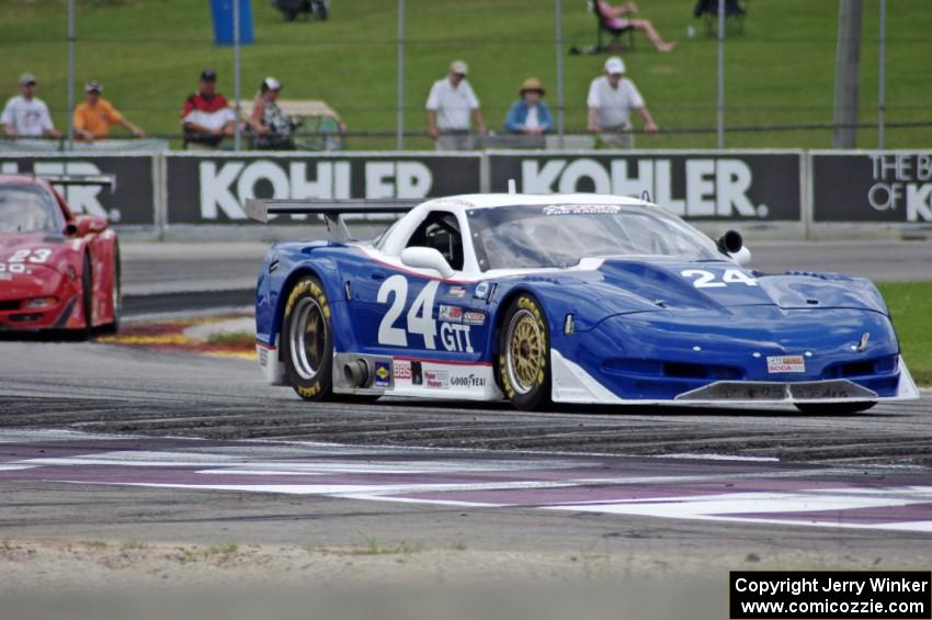 Rick Dittman's Chevy Corvette holds off Amy Ruman's Chevy Corvette