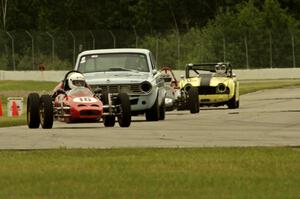 Four cars dive into turn 12