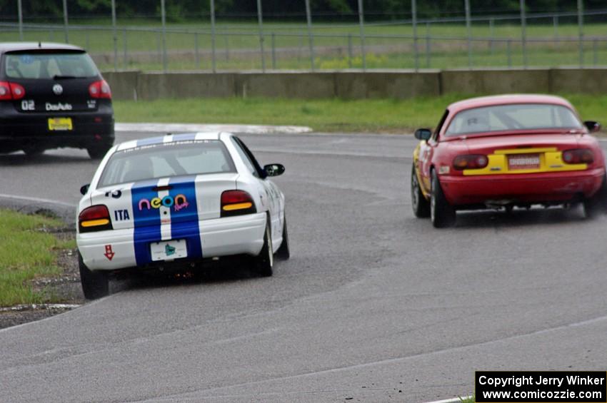 Tom Daly's SSC VW Rabbit, Greg Youngdahl's ITA Mazda Miata and John Glowaski's ITA Dodge Neon ACR