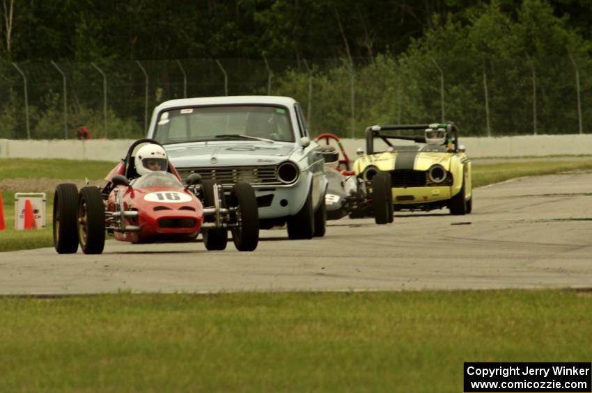 Four cars dive into turn 12