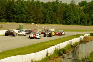 GT, Touring and Spec Miata field get the green at turn one