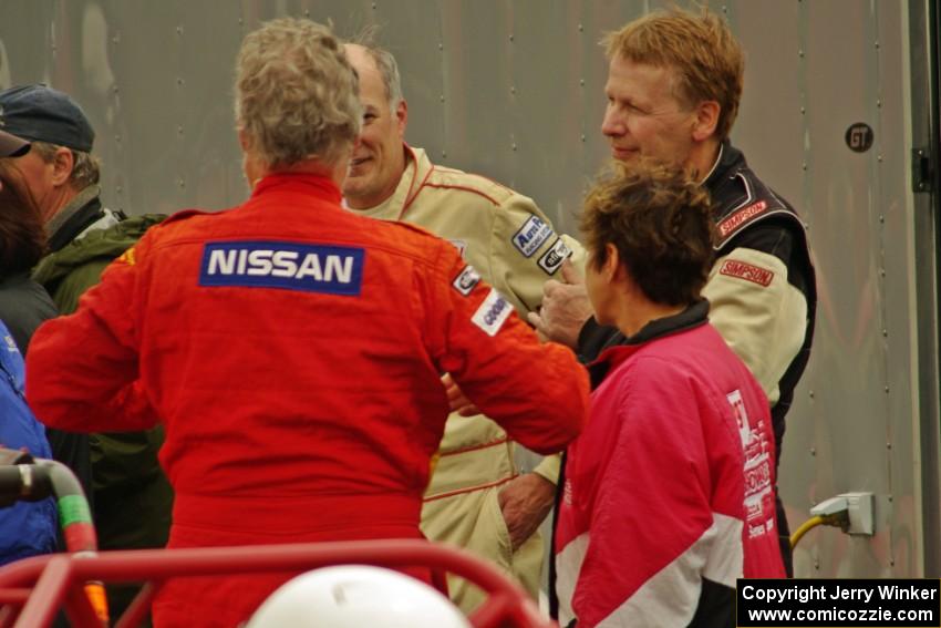 Don Haaversen, ??? and Jon Brakke converse after their race