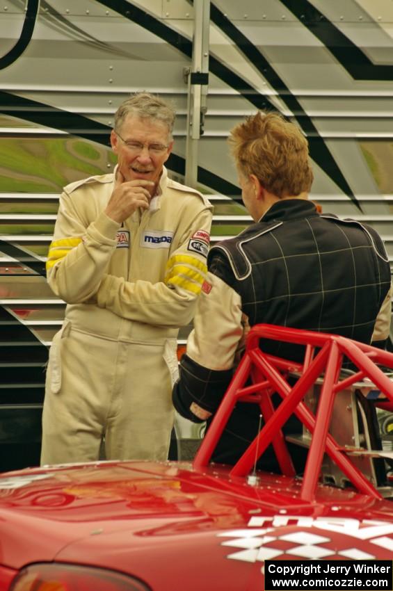 Mark and Jon Brakke converse after their race