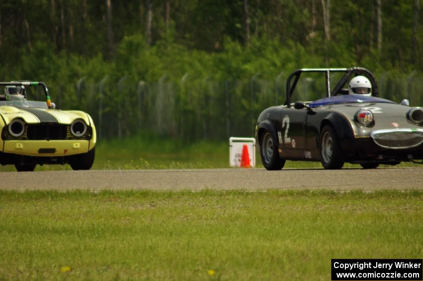 Phil Schaefer's Austin-Healey Sprite and John Hagen's Triumph TR-4