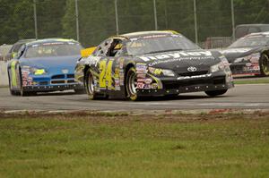 Cameron Hayley's Toyota Camry and John Wood's Dodge Charger