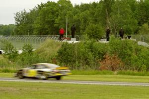 Spotters on the track's 20,000 gallon waste container inside the carousel