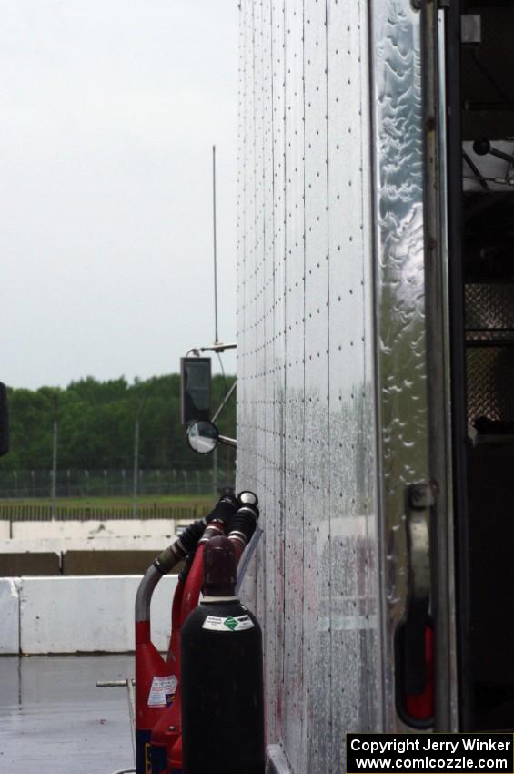 Rain water drizzling down the side of one of the transporters