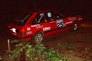 Gail Truess / Pattie Hughes Mazda 323GTX on a stage during the first night.