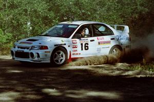 David Summerbell / Mike Fennell Mitubishi Lancer Evo IV at the spectator point on SS10 (Kabekona).