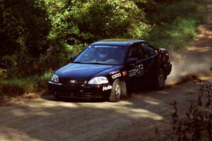 Jay Kowalik / Scott Embree Honda Civic CVT at the spectator point on SS10 (Kabekona).