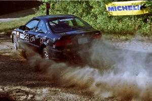 Jay Kowalik / Scott Embree Honda Civic CVT at the spectator point on SS10 (Kabekona).