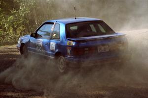 Kendall Russell / Lynn Dillon Dodge Shadow at the spectator point on SS10 (Kabekona).