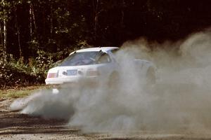 Craig Kazmierczak / Diane Sargent Mazda RX-7 at the spectator point on SS10 (Kabekona).